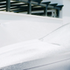 Snow foam cleaner, 500 ml, being sprayed onto a car.