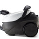 Black and white canister vacuum cleaner by Nilfisk with flexible hose and large rear wheel, side view