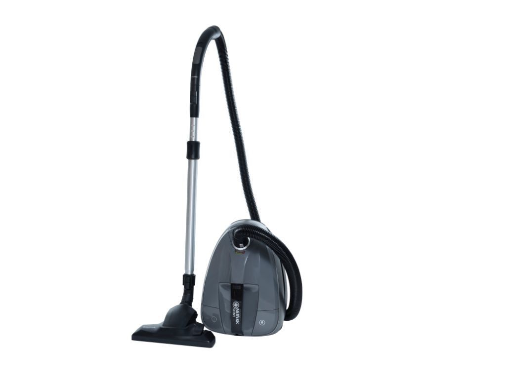 Gray canister vacuum cleaner by Nilfisk with a black hose and silver extension wand.