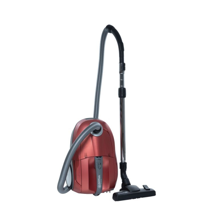 Red canister vacuum by Nilfisk with a flexible hose and adjustable wand.