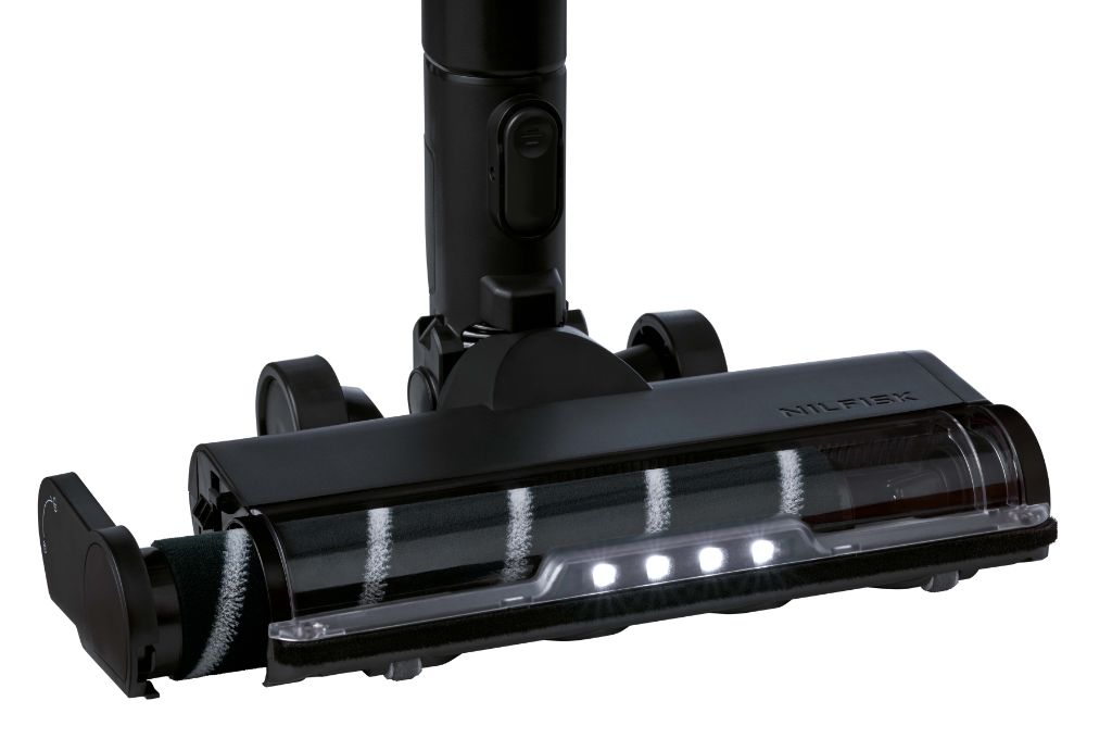 Black cordless stick vacuum cleaner by Nilfisk, featuring a motorized brush head with LED lights.