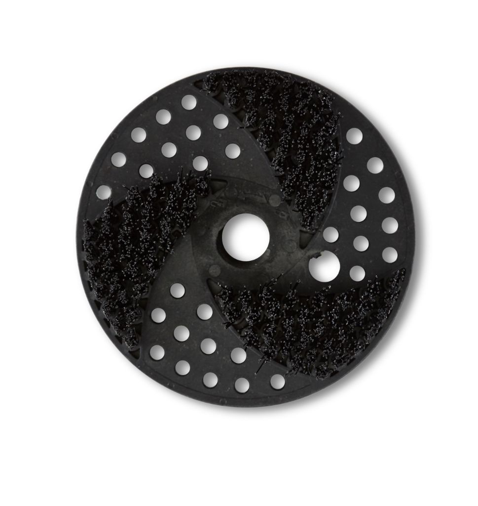 Black multi brush kit for high-pressure washers with holes and dark brush filaments.