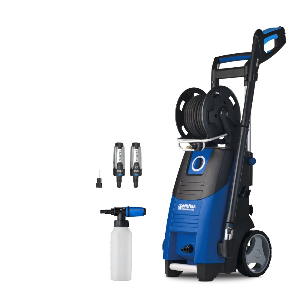 Blue high pressure washer by Nilfisk with hose reel, nozzle attachments, and two black brush heads.