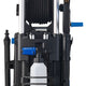 High-pressure washer from Nilfisk with a black frame, a hose reel, and a detergent bottle.