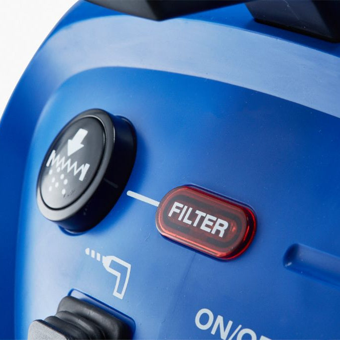 Blue wet/dry vacuum by ES Multi, featuring filter button and power switch close up.
