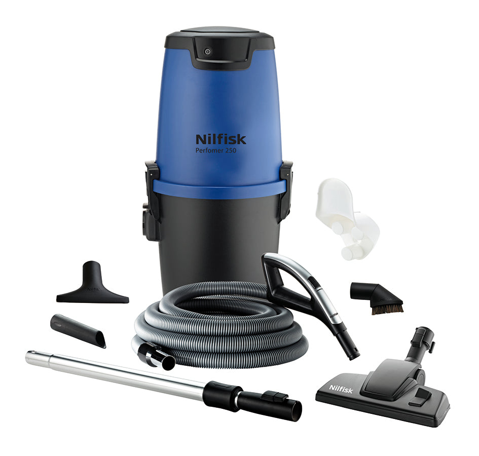 Blue and black vacuum cleaner by Nilfisk with hose and various attachments.