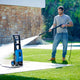 Pressure washer hose, 6m long, with spray gun in use, by ES, outdoors on a green lawn.