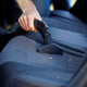 Wet and dry vacuum cleaner by ES Buddy II being used on an auto seat.