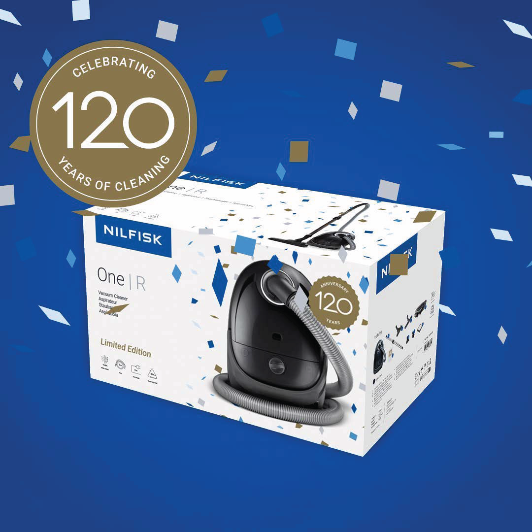 Black canister vacuum cleaner by Nilfisk in 120th anniversary limited edition packaging with blue and gold confetti design, front view