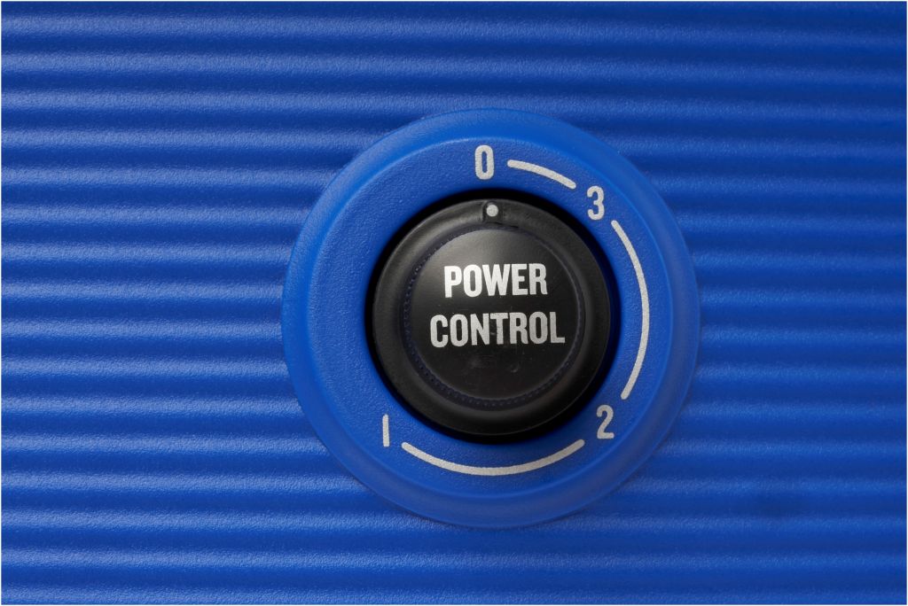 Blue high-pressure washer power control by Core with settings from zero to three.