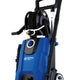 Blue and black pressure washer by Nilfisk with hose reel, silver handle and wheels.